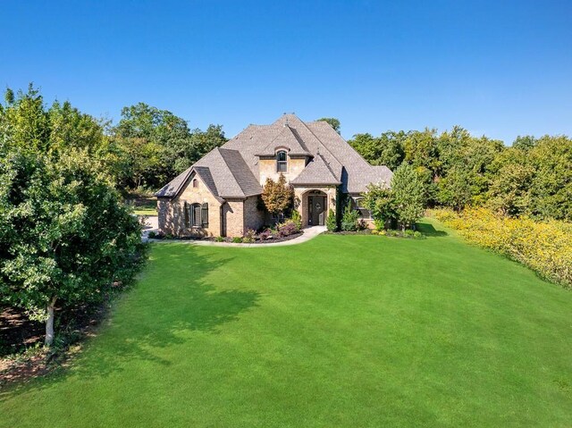 5309 Wheatley Way, Edmond, OK 73034 - french provincial home with a front yard