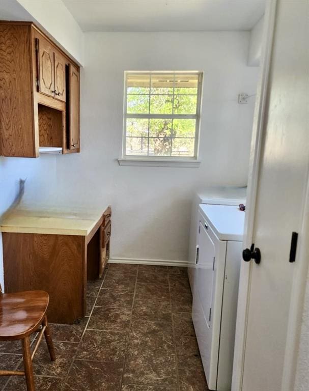 laundry area with cabinets and washer and dryer