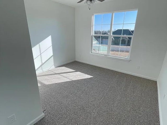 unfurnished room with ceiling fan