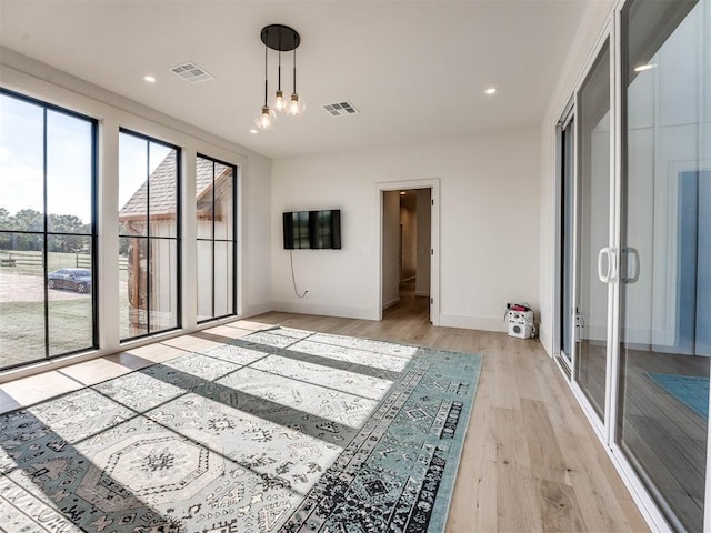 interior space with light hardwood / wood-style floors