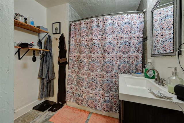 bathroom with vanity and a shower with curtain