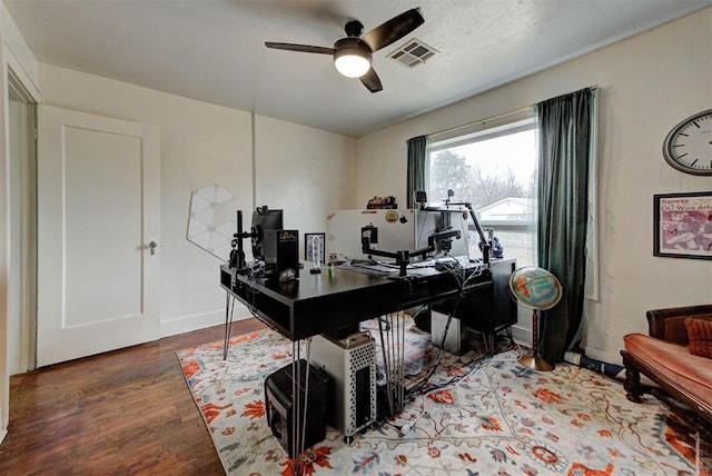 office area with wood-type flooring and ceiling fan