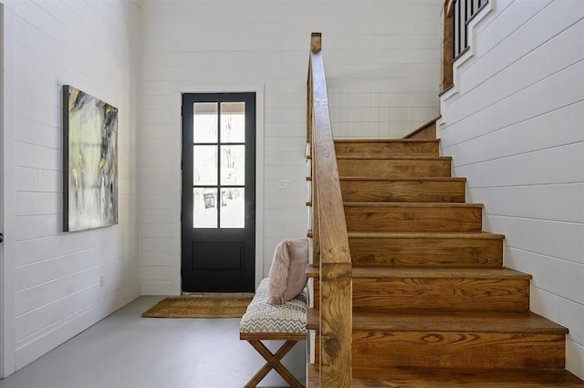 foyer featuring concrete floors