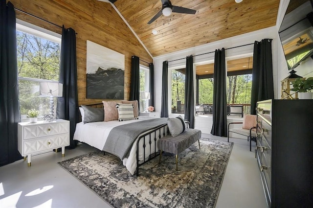 bedroom featuring concrete flooring, vaulted ceiling, wooden ceiling, and multiple windows