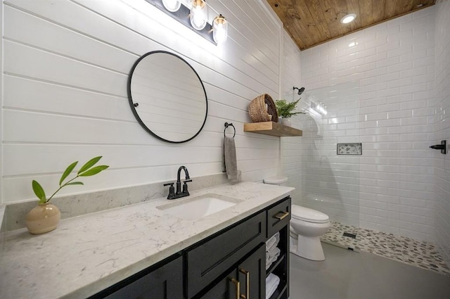 bathroom featuring vanity, wood ceiling, toilet, and tiled shower