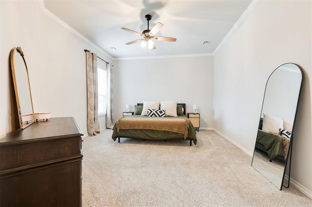 carpeted bedroom with crown molding and ceiling fan