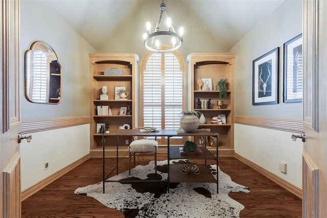 office area featuring an inviting chandelier, vaulted ceiling, and dark hardwood / wood-style floors