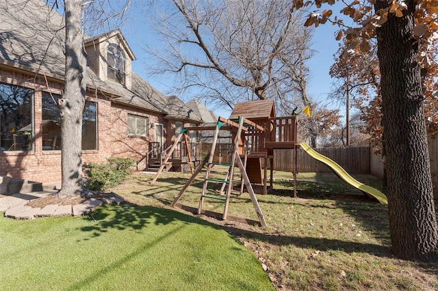 view of jungle gym with a yard