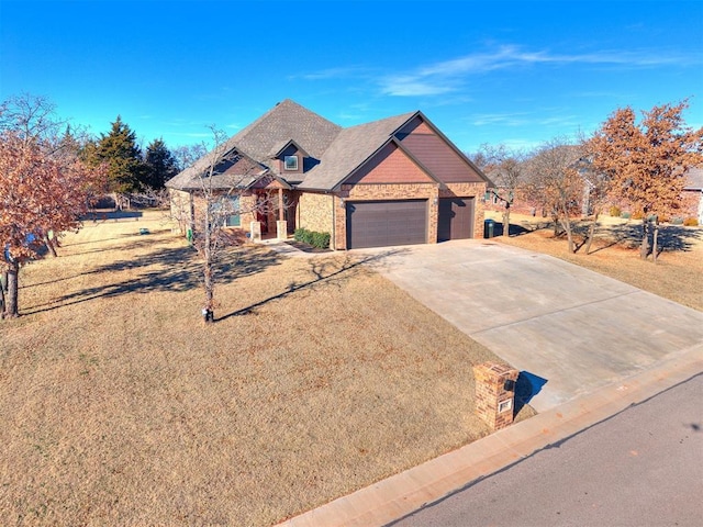 craftsman inspired home with a garage and a front yard