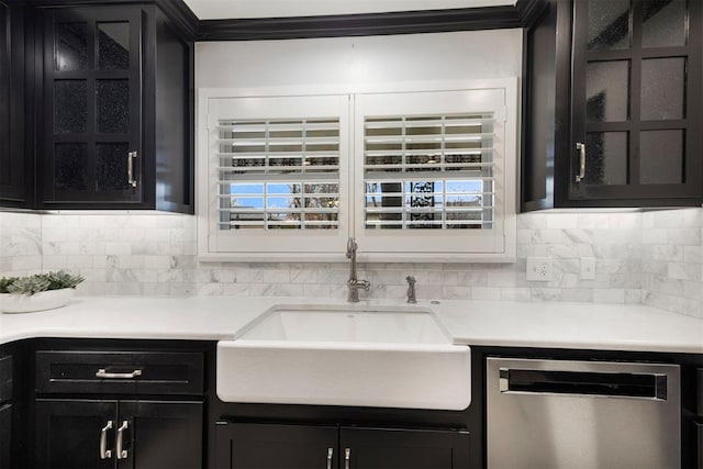 kitchen with dishwasher, sink, and decorative backsplash