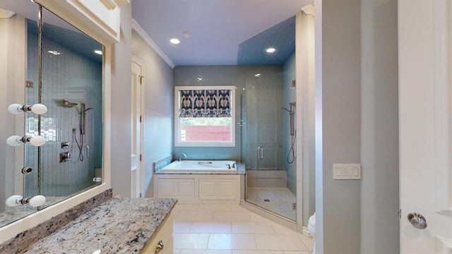 bathroom featuring tile patterned flooring, vanity, crown molding, and independent shower and bath