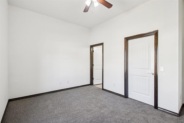 unfurnished bedroom featuring carpet and ceiling fan