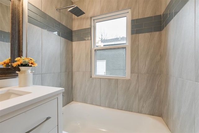 bathroom with vanity and  shower combination