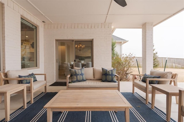 wooden deck featuring fence and an outdoor living space