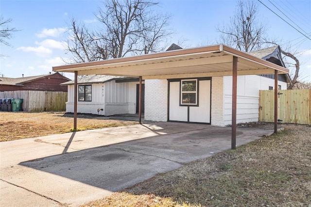 view of front of property with a carport