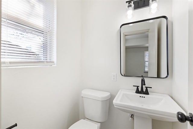 bathroom with sink and toilet