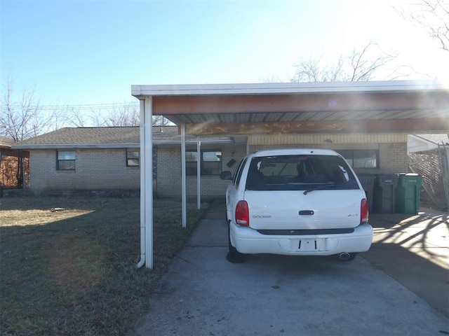 view of parking / parking lot featuring a carport