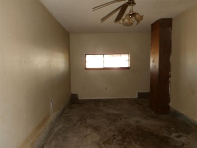 empty room with ceiling fan