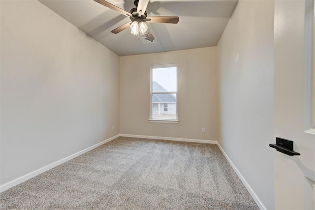 carpeted empty room featuring ceiling fan