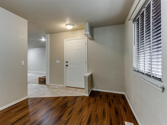 entrance foyer with hardwood / wood-style flooring