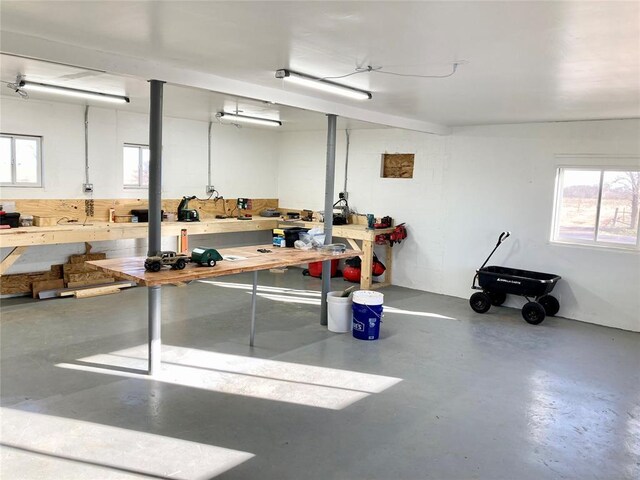 garage with a workshop area