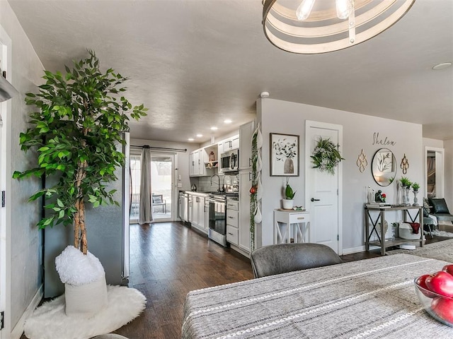 living room with dark wood-type flooring