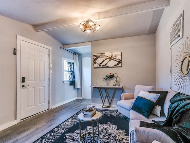 living room with wood-type flooring and beam ceiling