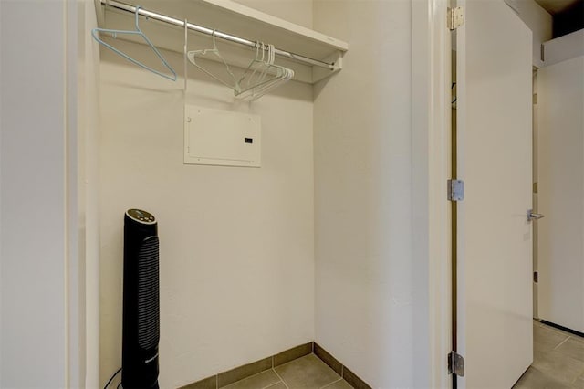 laundry room featuring light tile patterned flooring