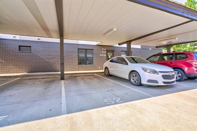 view of parking with a carport