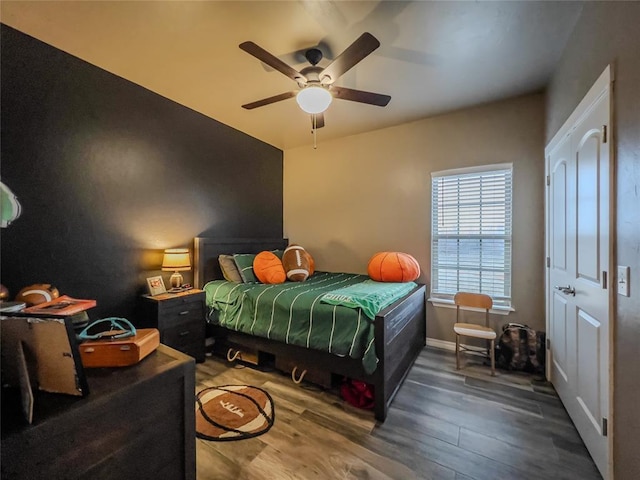 3629 W County Street 2850th St, Ninnekah, OK 73067 - bedroom with wood finished floors, ceiling fan, and baseboards