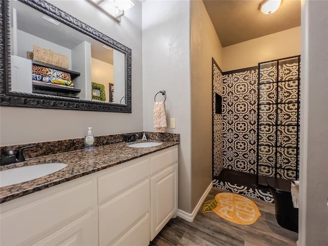 3629 W County Street 2850th St, Ninnekah, OK 73067 - full bathroom with a shower, wood finished floors, double vanity, and a sink