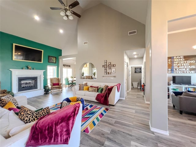 3629 W County Street 2850th St, Ninnekah, OK 73067 - living room with high vaulted ceiling, ceiling fan, visible vents, and wood finished floors