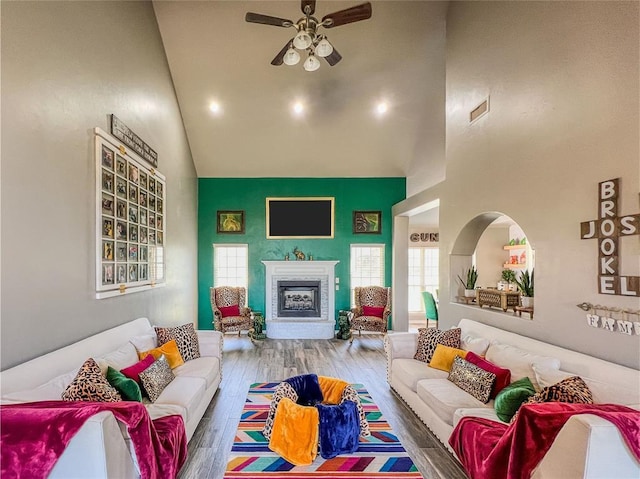 3629 W County Street 2850th St, Ninnekah, OK 73067 - living room featuring high vaulted ceiling, ceiling fan, visible vents, and a fireplace