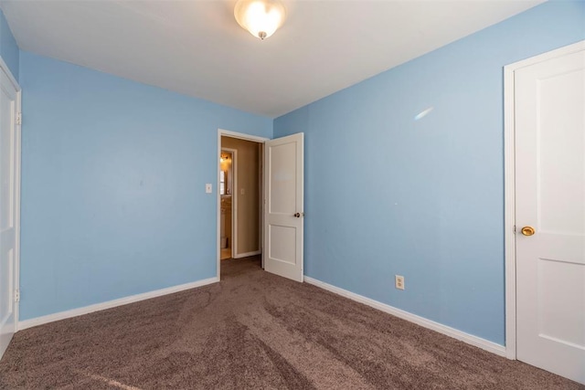 unfurnished bedroom featuring carpet flooring