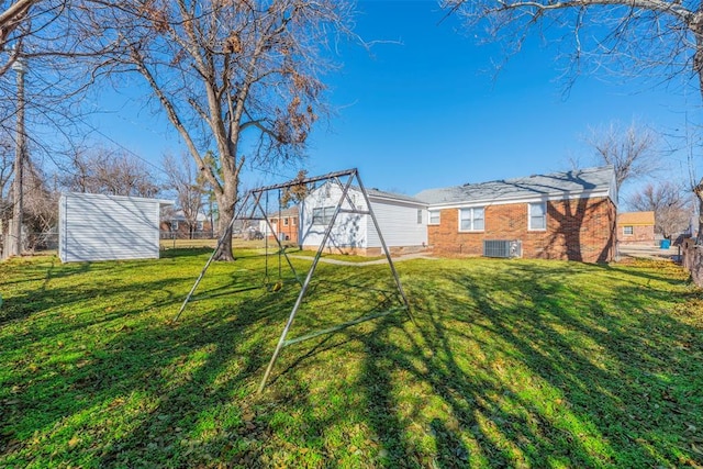 view of yard featuring central AC