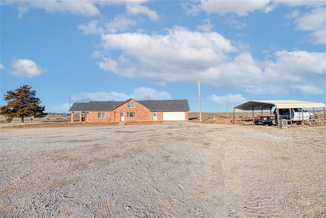 view of front of house featuring a carport