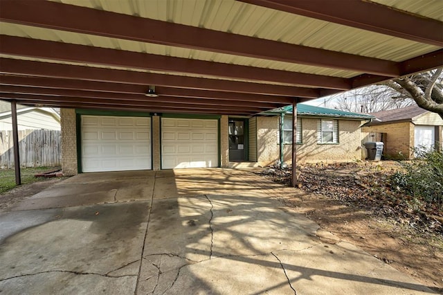 view of patio featuring a garage