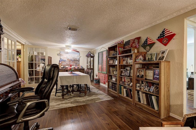 office space featuring ornamental molding, dark hardwood / wood-style floors, a textured ceiling, and ceiling fan