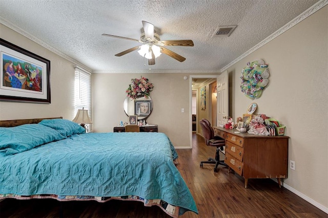 bedroom with dark hardwood / wood-style flooring, ceiling fan, crown molding, and a textured ceiling