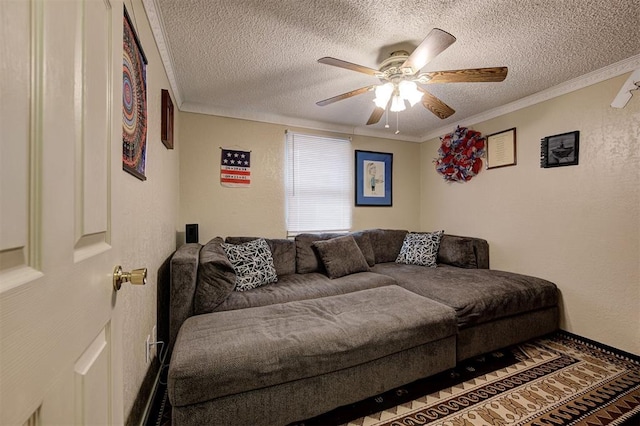 living room featuring ceiling fan, crown molding, and a textured ceiling