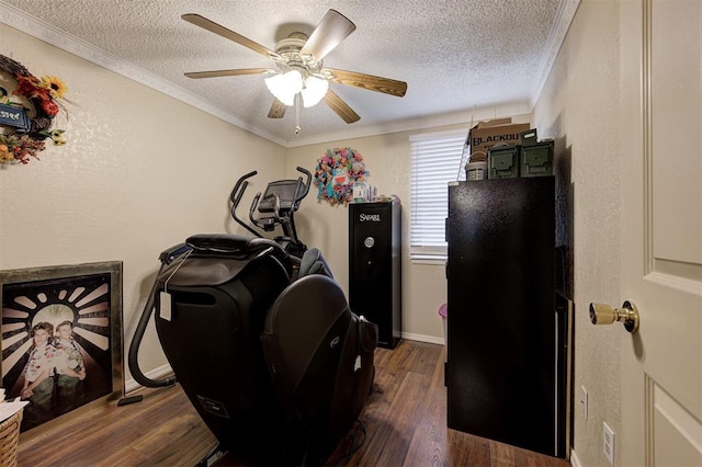 interior space with ceiling fan, ornamental molding, dark hardwood / wood-style floors, and a textured ceiling