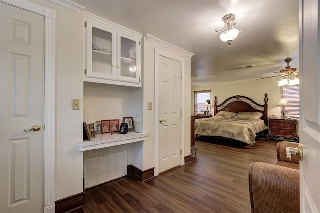 bedroom featuring dark hardwood / wood-style floors