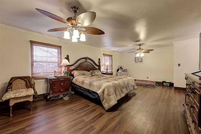 bedroom with multiple windows, ornamental molding, and dark wood-type flooring