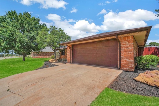 garage with a yard