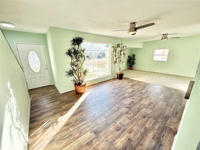 entryway featuring dark hardwood / wood-style floors and ceiling fan