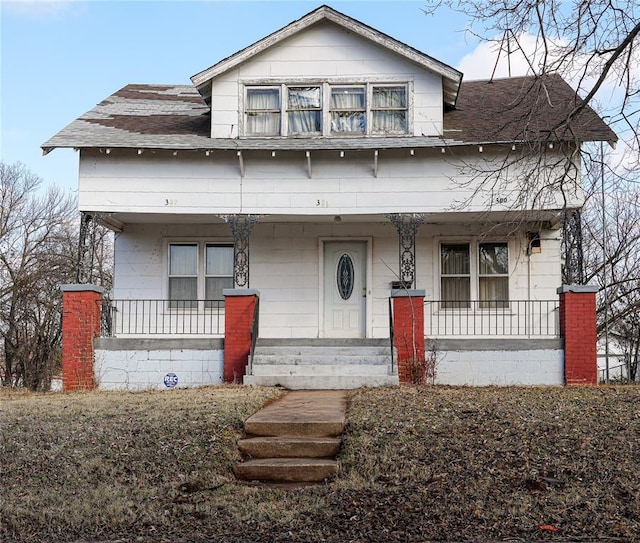 bungalow-style house featuring covered porch