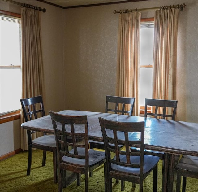 view of carpeted dining space