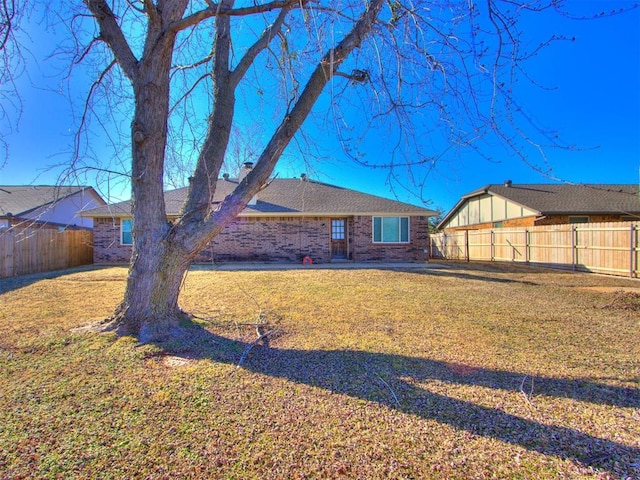 720 Cottonwood Dr, Moore, OK 73160 - back of property featuring brick siding
