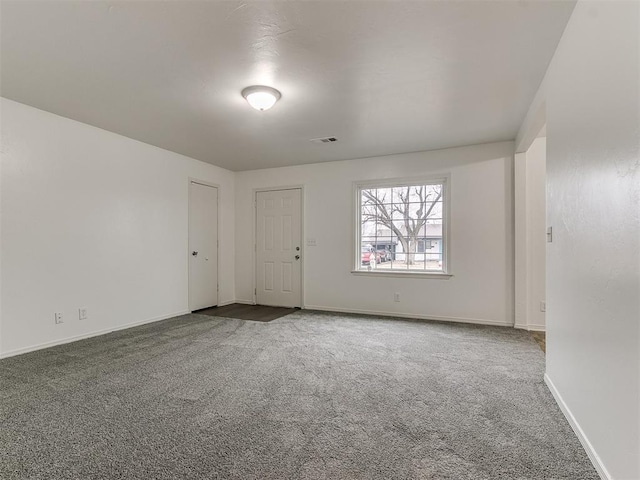 empty room with carpet floors