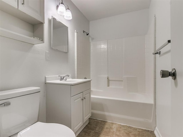 full bathroom with vanity, toilet, and washtub / shower combination